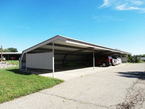 Durand apartment for rent - a car garage with cars parked in it