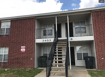 Killeen apartment for rent - an apartment building with stairs up to a balcony