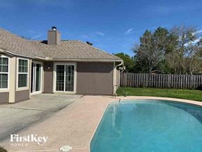 Middleburg house for rent - a swimming pool in front of a house