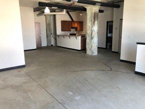 Cleveland apartment for rent - a large empty room with a kitchen in it