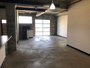 Cleveland apartment for rent - an empty room with a concrete floor and a window