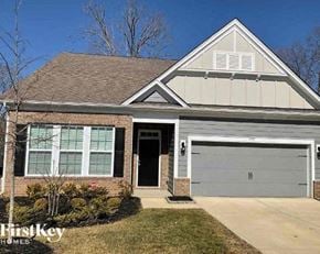 Mooresville house for rent - A house with a garage door numbered 1155 is shown.