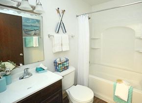 Saginaw apartment for rent - a bathroom with a toilet and a sink and a shower
