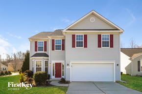 Greensboro house for rent - A two-story house with a garage is for sale by FirstKey Homes.