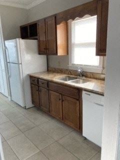 Rome apartment for rent - a kitchen with a sink and a refrigerator