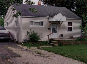 Columbus house for rent - A small house with the number 2706 on the front.