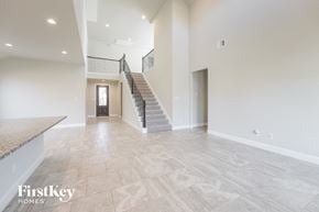 Richmond house for rent - the spacious living room with the staircase leading to the second floor