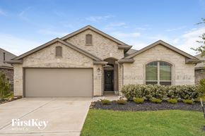 Richmond house for rent - A house with a garage door that is numbered 311.