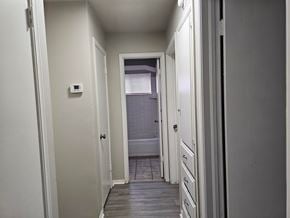 Oklahoma City house for rent - A white door is open to a bathroom.