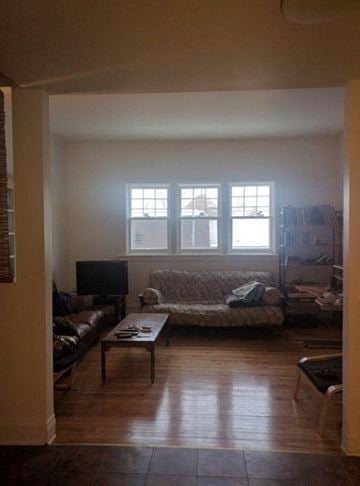 Ottawa apartment for rent - a living room with a couch and a table