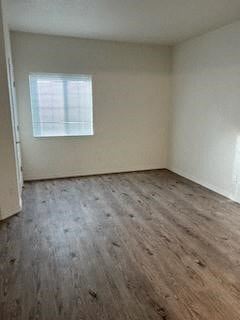 El Paso apartment for rent - an empty room with wooden floors and a window