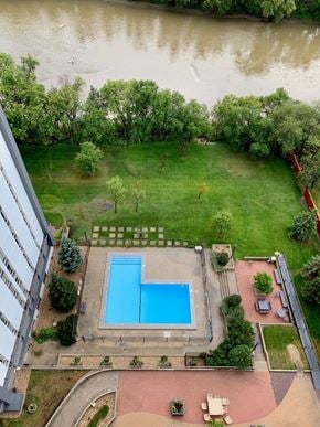 Winnipeg apartment for rent - an aerial view of a swimming pool in the middle of a building