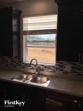 Lancaster house for rent - a kitchen sink in front of a window