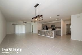 Davenport house for rent - A spacious, well-lit kitchen and living room with a modern design.