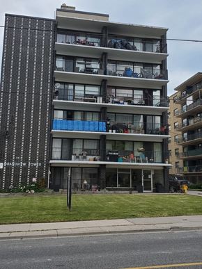 Toronto apartment for rent - an apartment building on the side of a street