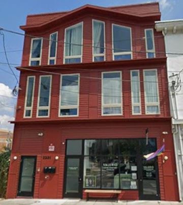 Philadelphia apartment for rent - A red building with the number 23231 on the front.
