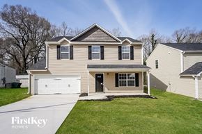 High Point house for rent - A two-story house with a garage is for sale.