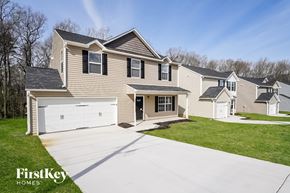 High Point house for rent - A house with a garage is shown in the image.