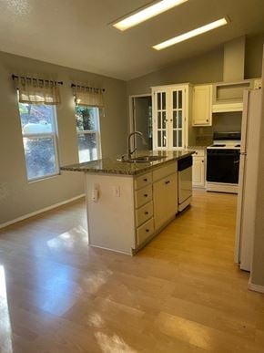 Garden Valley house for rent - an empty kitchen with an island in the middle