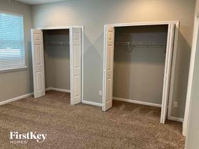 Jacksonville house for rent - a bedroom with two closets and two doors