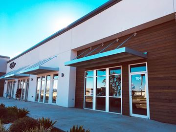 Youngsville apartment for rent - the front of a building with glass doors