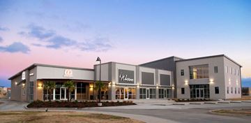 Youngsville apartment for rent - the exterior of a walmart building at sunset