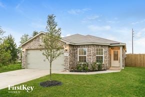 Hockley house for rent - A brick house with a tree in front of it.