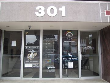East Lansing apartment for rent - The front of a building with the number 301 on it.
