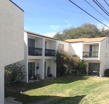 San Angelo apartment for rent - an apartment building with a yard in front of it