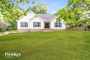 Mccalla house for rent - A house with a lawn in front of it.
