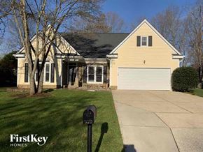 Indian Trail house for rent - a house with a driveway and a parking meter in front of it