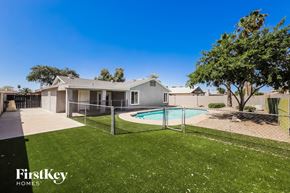 Glendale house for rent - A house with a pool in the backyard.