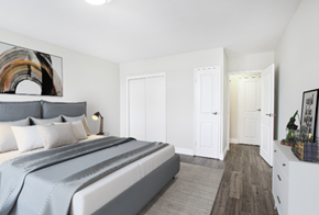 Dartmouth apartment for rent - A bedroom with a large bed and a painting on the wall.
