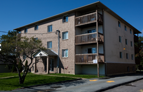 Dartmouth apartment for rent - A large apartment building with a balcony on the second floor.