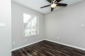 Norwalk apartment for rent - an empty room with a ceiling fan and a window