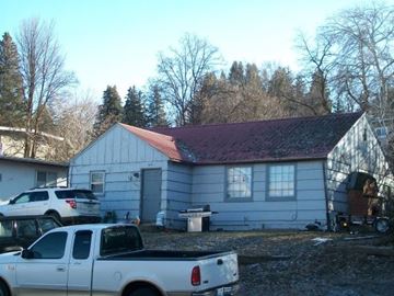 Pullman apartment for rent - a house with a truck parked in front of it