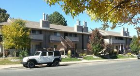 Denver apartment for rent - a truck parked in front of an apartment building