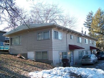 Pullman apartment for rent - a house with a car parked in front of it