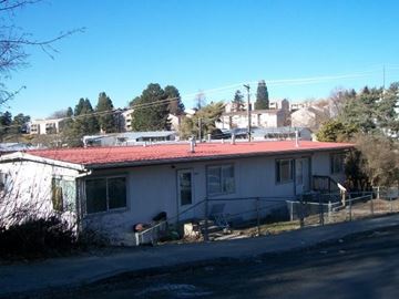 Pullman apartment for rent - a small white house with a red roof