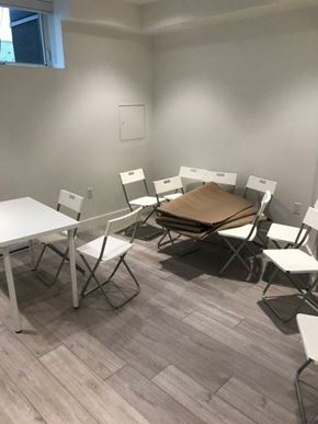 Vancouver apartment for rent - A room with a table and chairs.