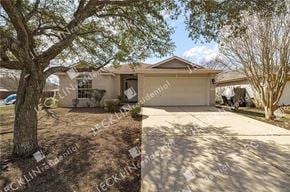 Leander house for rent - A house with a tree in front of it.