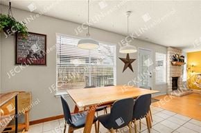 Pflugerville house for rent - A dining room with a wooden table and chairs.