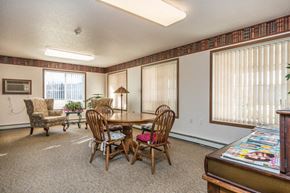 Fargo townhouse for rent - a dining room with a table and chairs