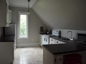 New Glasgow apartment for rent - a kitchen with a stove and a sink