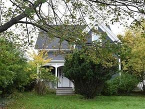 New Glasgow apartment for rent - a white house with a tree in front of it