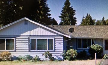 Oregon City apartment for rent - a blue and white house with a satellite dish on the roof