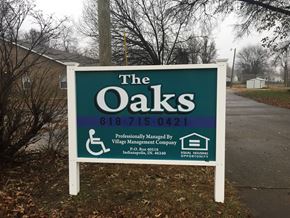 Mt. Carmel apartment for rent - a sign for the handicap accessible housing facility in front of a driveway