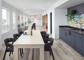 Philadelphia apartment for rent - A modern dining room with a long table and chairs.