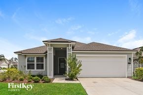 Fernandina Beach house for rent - A house with a garage door and a front door is shown.