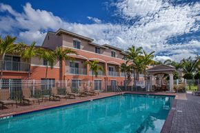 Boynton Beach apartment for rent - Preserve at Boynton Beach resort style pool with lounge chairs at Preserve at Boynton Beach, Boynton Beach, FL, 33435